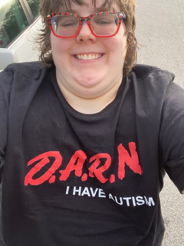 Customer photo review of DARN I Have Autism Unisex t-shirt