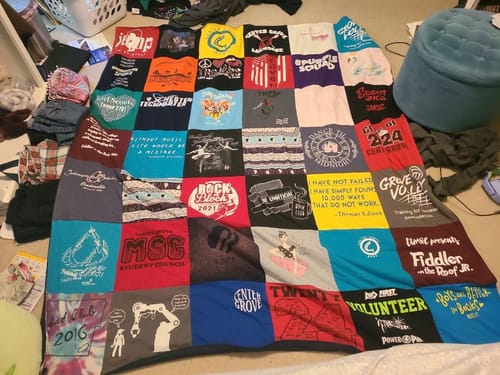 T-shirt quilt with theater, music themes by Julie from IN