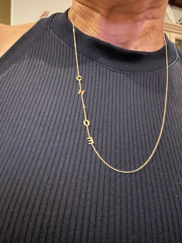 Customer photo review of 14K Solid Gold Sideways Paw Initial Necklace