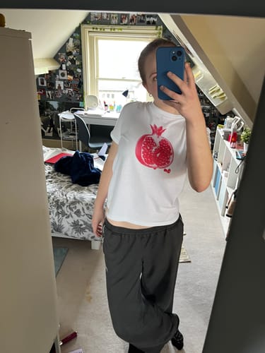 Customer photo review of 'Pomegranate' baby tee