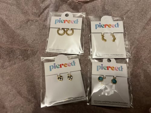 Customer photo review of Triple Star Charms