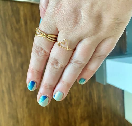 Customer photo review of Messika 18K Gold Crystal Cross Ring