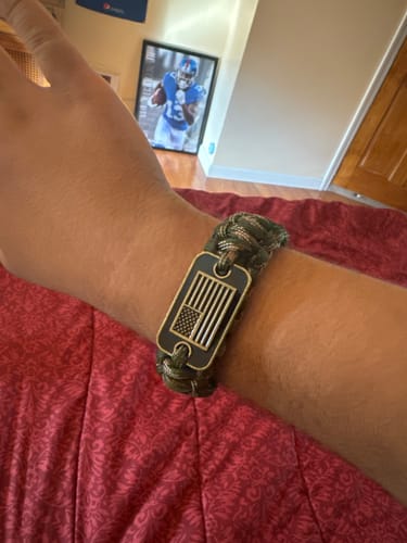 Customer photo review of Camo Paracord Bronze Flag Bracelet- Helps Pair Veterans With A Companion Dog