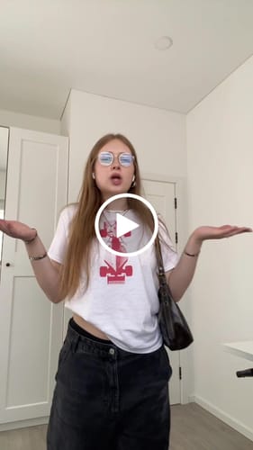 Customer video review of 'Racing Car' baby tee