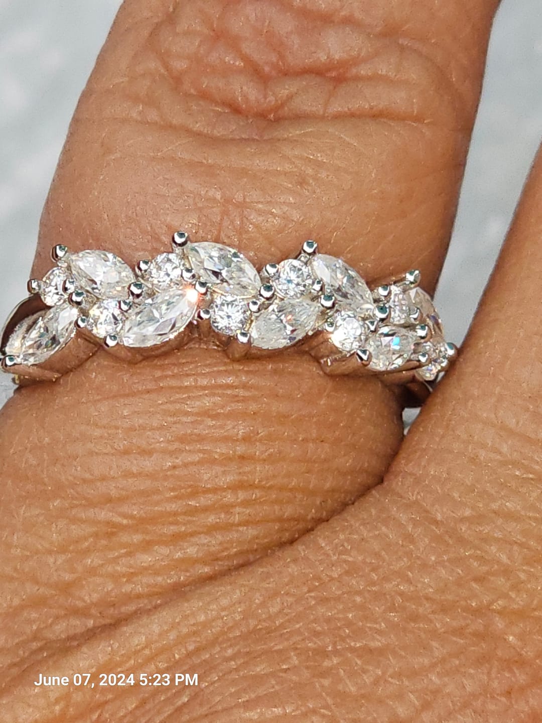 Customer photo review of Alternating Marquise And Round Moissanite Half Eternity Wedding Band