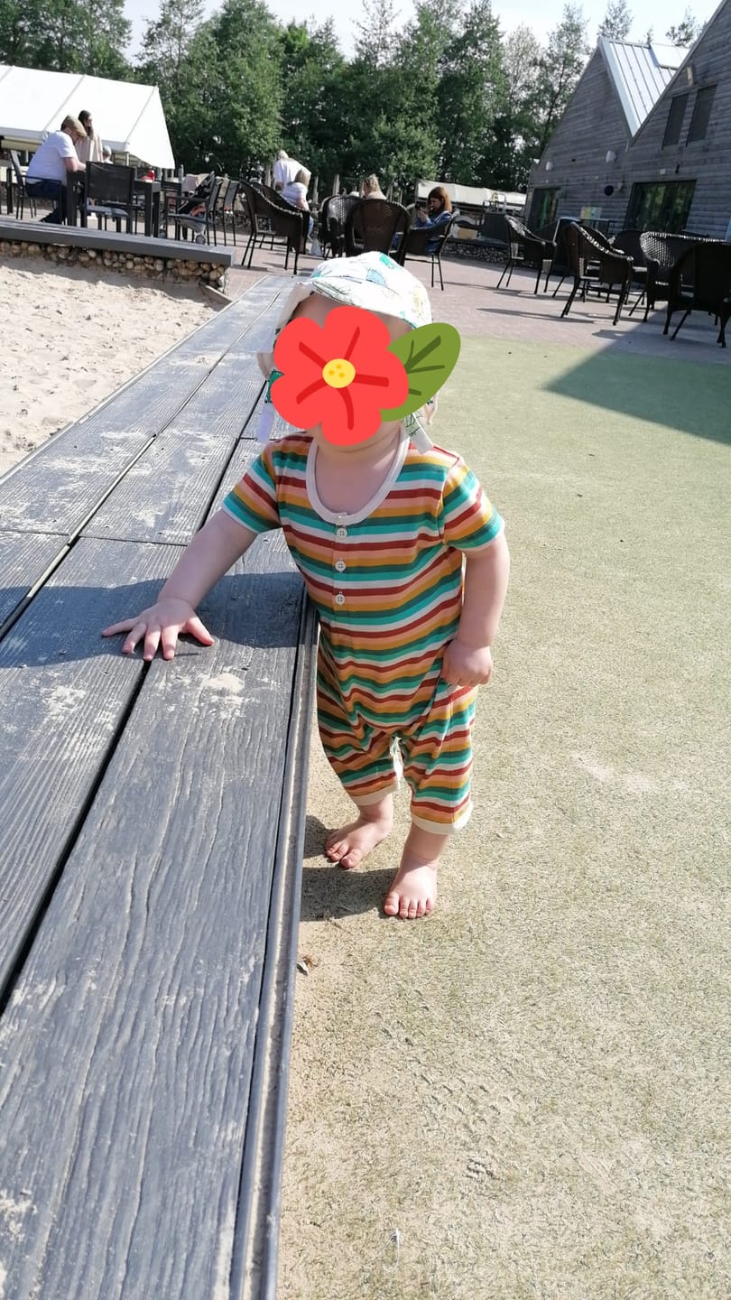 Customer photo review of Rainbow Striped Organic Summer Romper
