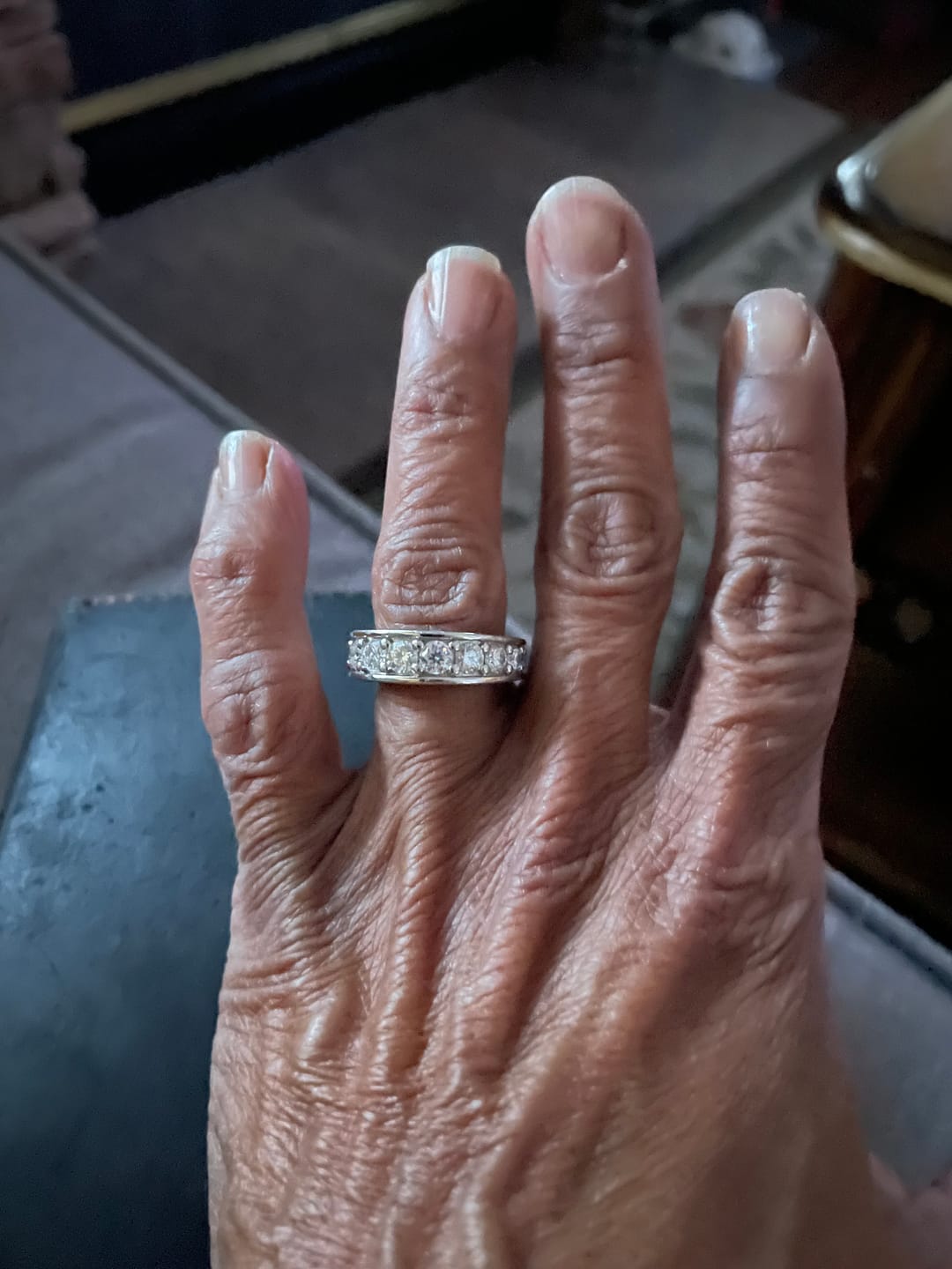 Customer photo review of Triple Channel Set Moissanite Half Eternity Wedding Band