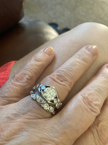 Customer photo review of Bezel Set Round Moissanite Scroll Accents Engagement Ring