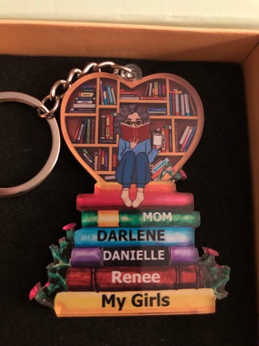 Customer photo review of Personalized Acrylic Keychain - A Girl, A Woman Who Loves Books