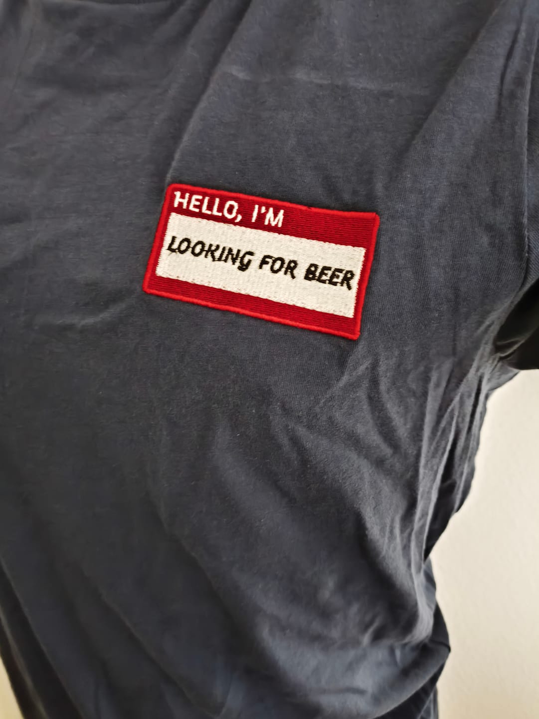 Customer photo review of HELLO I'M LOOKING FOR BEER - Name Tag T-Shirt