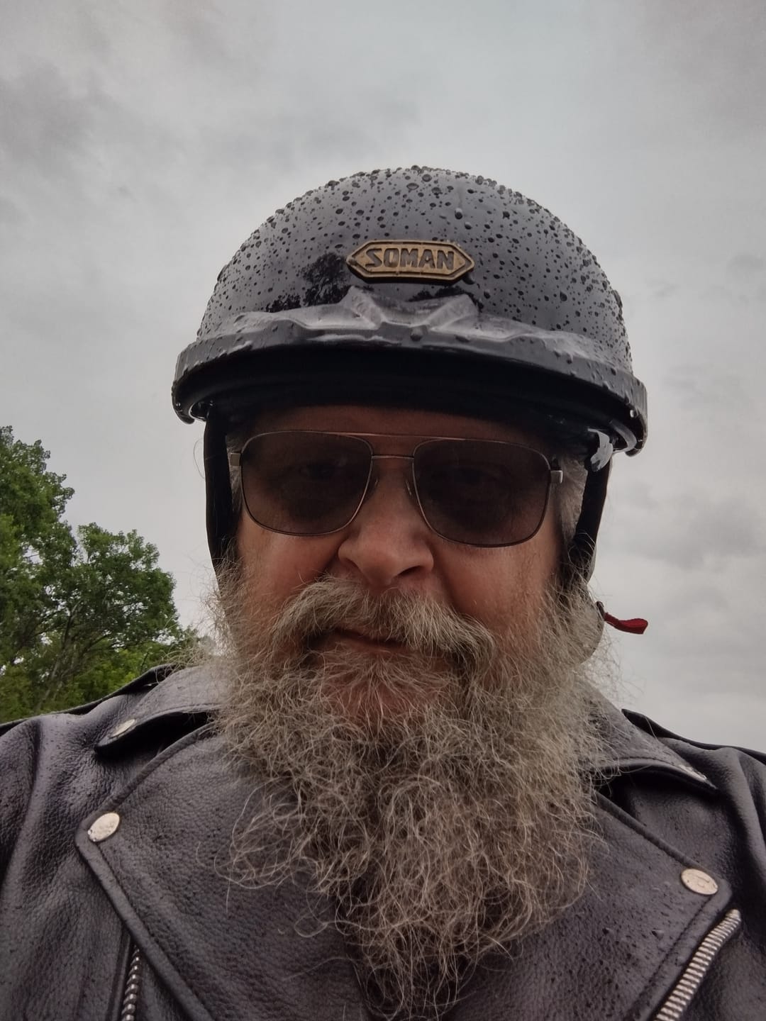 Customer photo review of Sturgis Style Half Helmet with Retractable UV Lens - Gloss Black