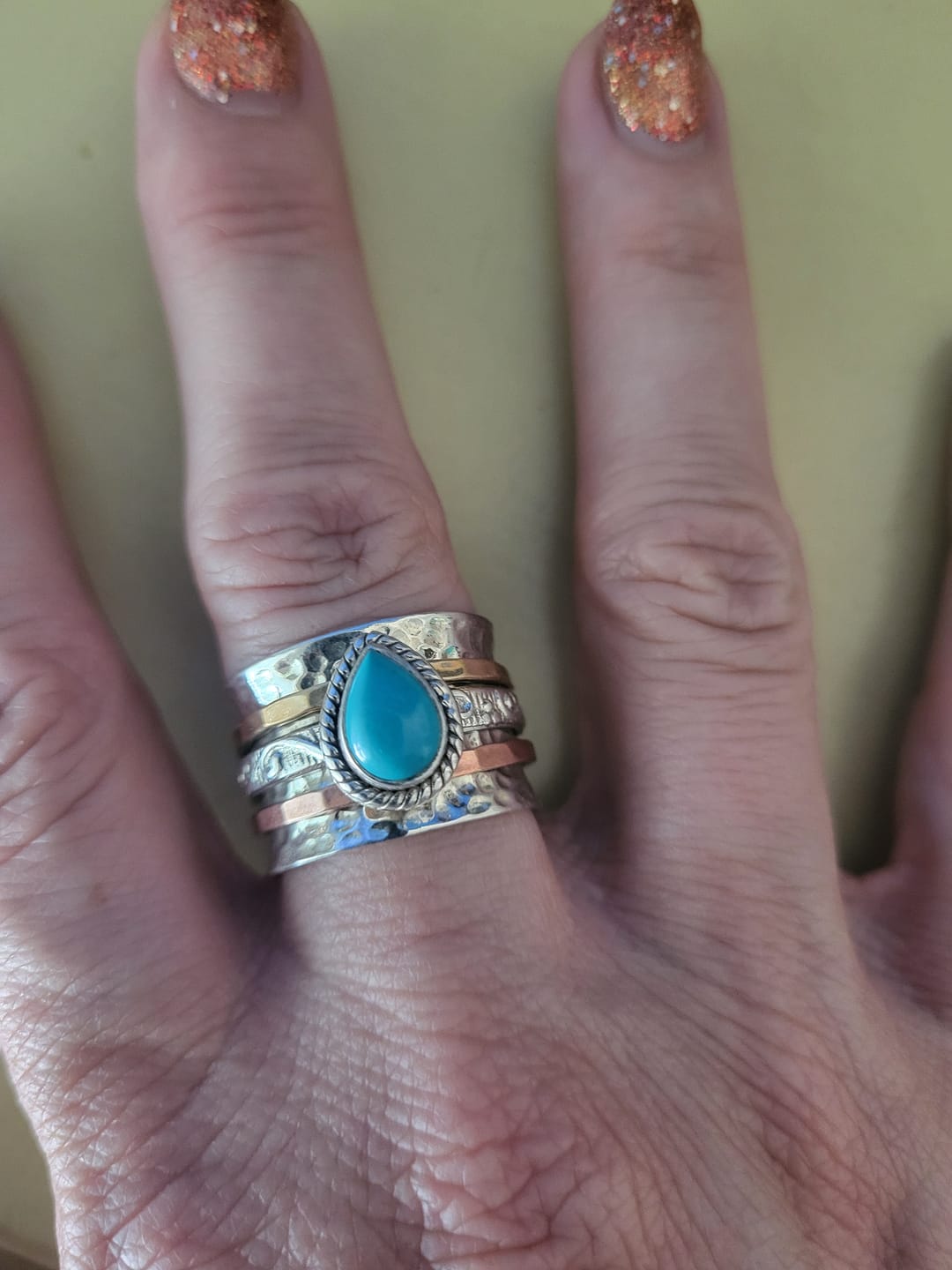 Customer photo review of Teardrop Turquoise Fidget Ring Sterling Silver