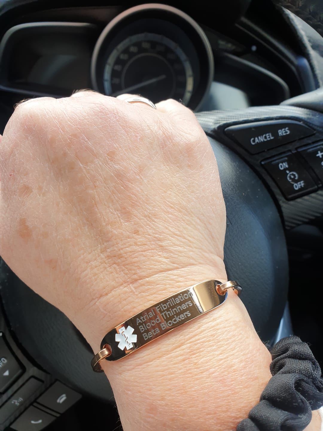 Customer photo review of Personalised Rose Gold Medical Alert ID Bangle Bracelet