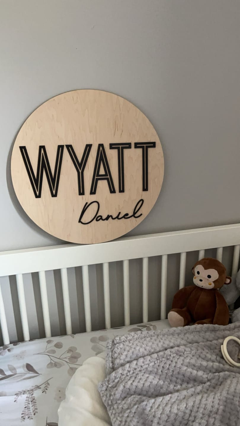 Customer photo review of Round Nursery Name Sign