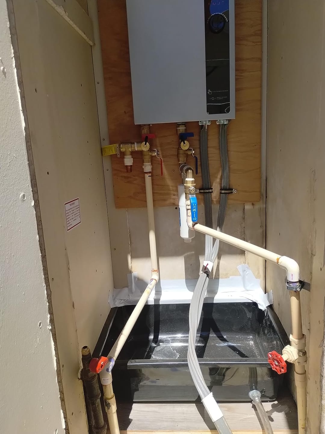 Customer photo review of Tankless Electric On Demand Instant Hot Water Heater - 240V | 18kW