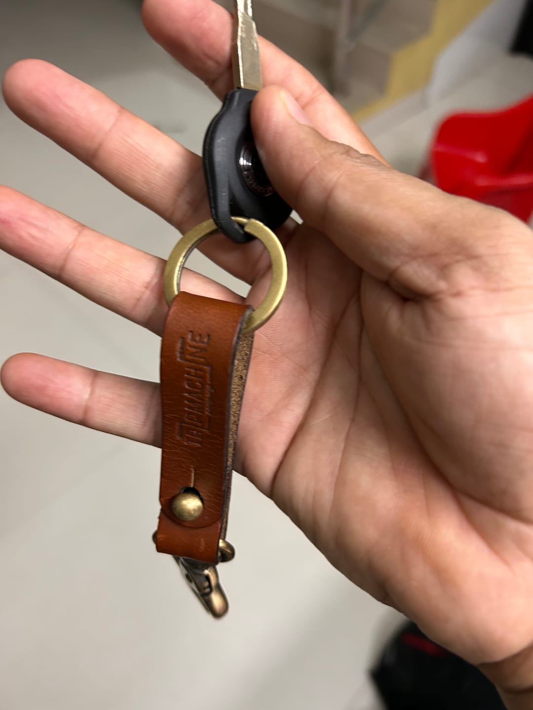 Customer photo review of key fob with antique gold
