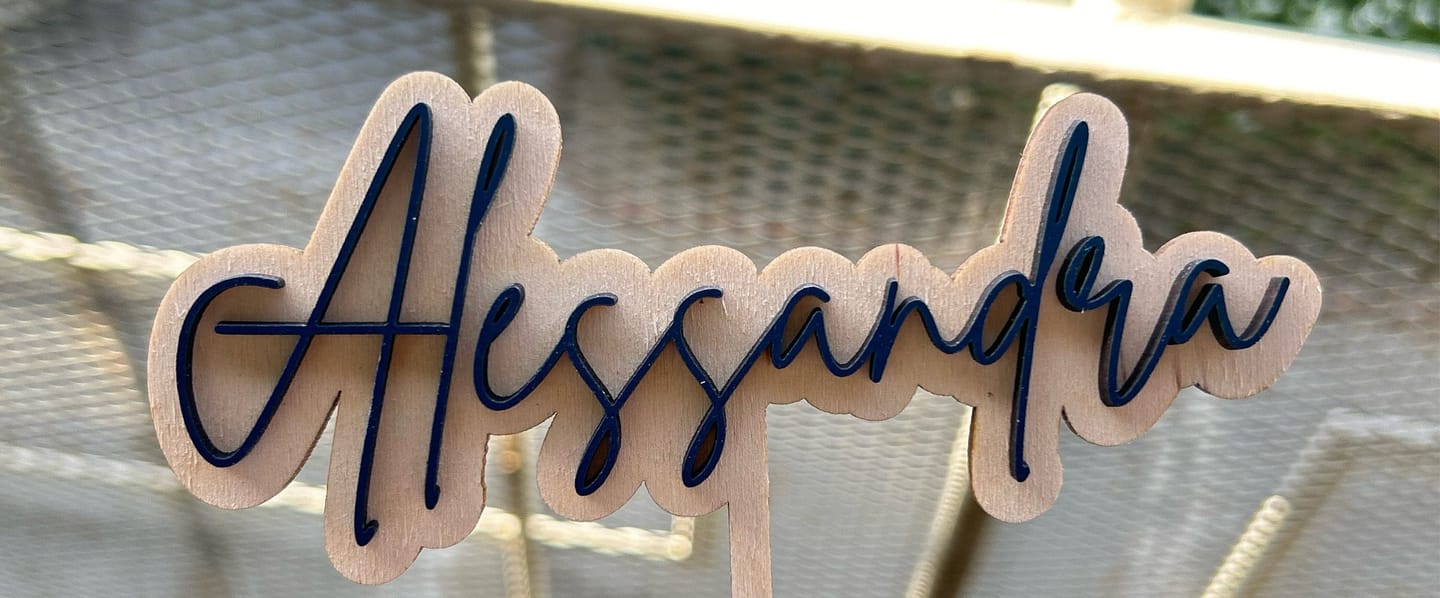 Customer photo review of Name Cake Topper
