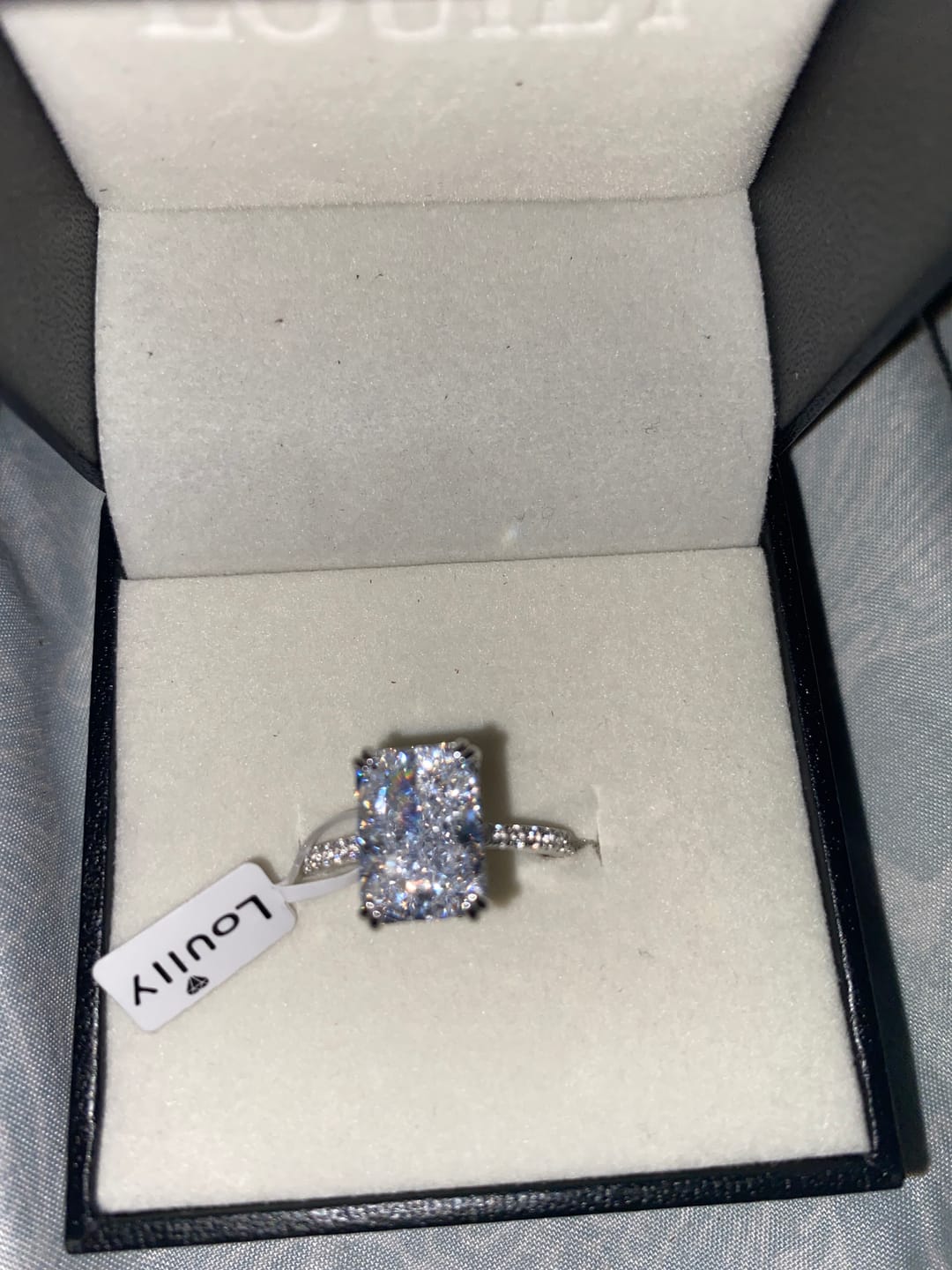 Customer photo review of S925 4.5Ct Radiant Cut Engagement Ring Moissanite/Simulated Diamond Solitaire Stackable Travel Ring For Women