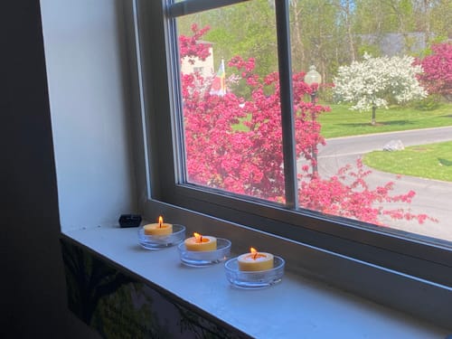 Customer photo review of Tibetan Tealight Vanaspati Ghee Butter Lamp Candle Set for Meditation, Ceremonies, Rituals, Altars, Diwali (Clear Container)