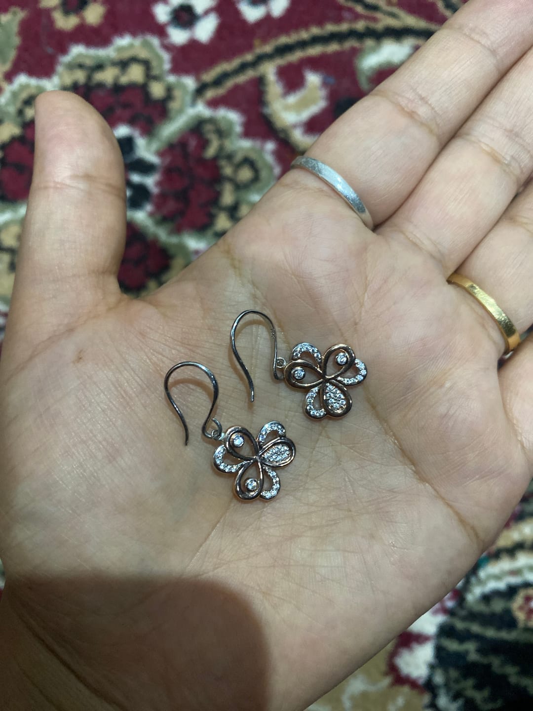 Customer photo review of Lucky Omen Dual-Tone Silver Earrings