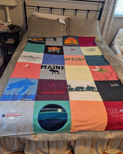 T-shirt quilt with travel, outdoor activities themes by Lisa from MI