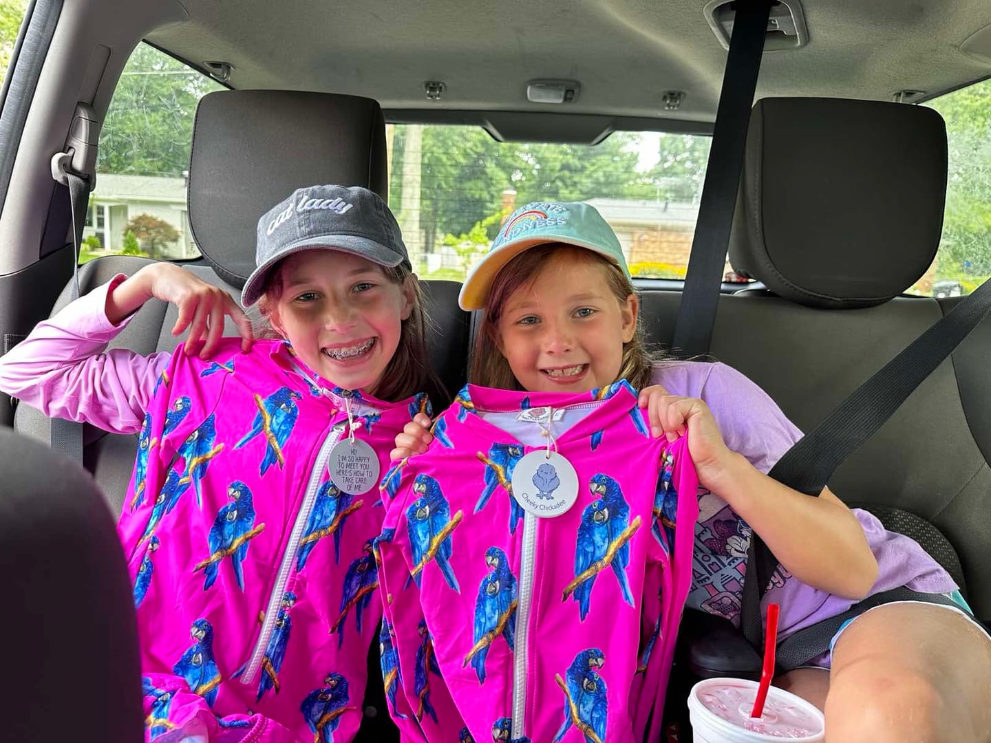 Customer photo review of PREORDER Fluro Macaw Girls Long Sleeve Zip Swimmers (Ships w/c 6th May)