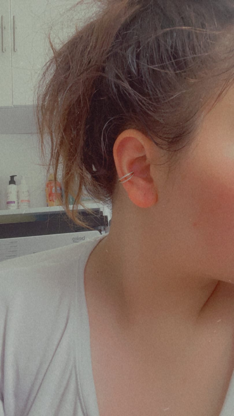 Customer photo review of Double Clicker Piercing | Titan