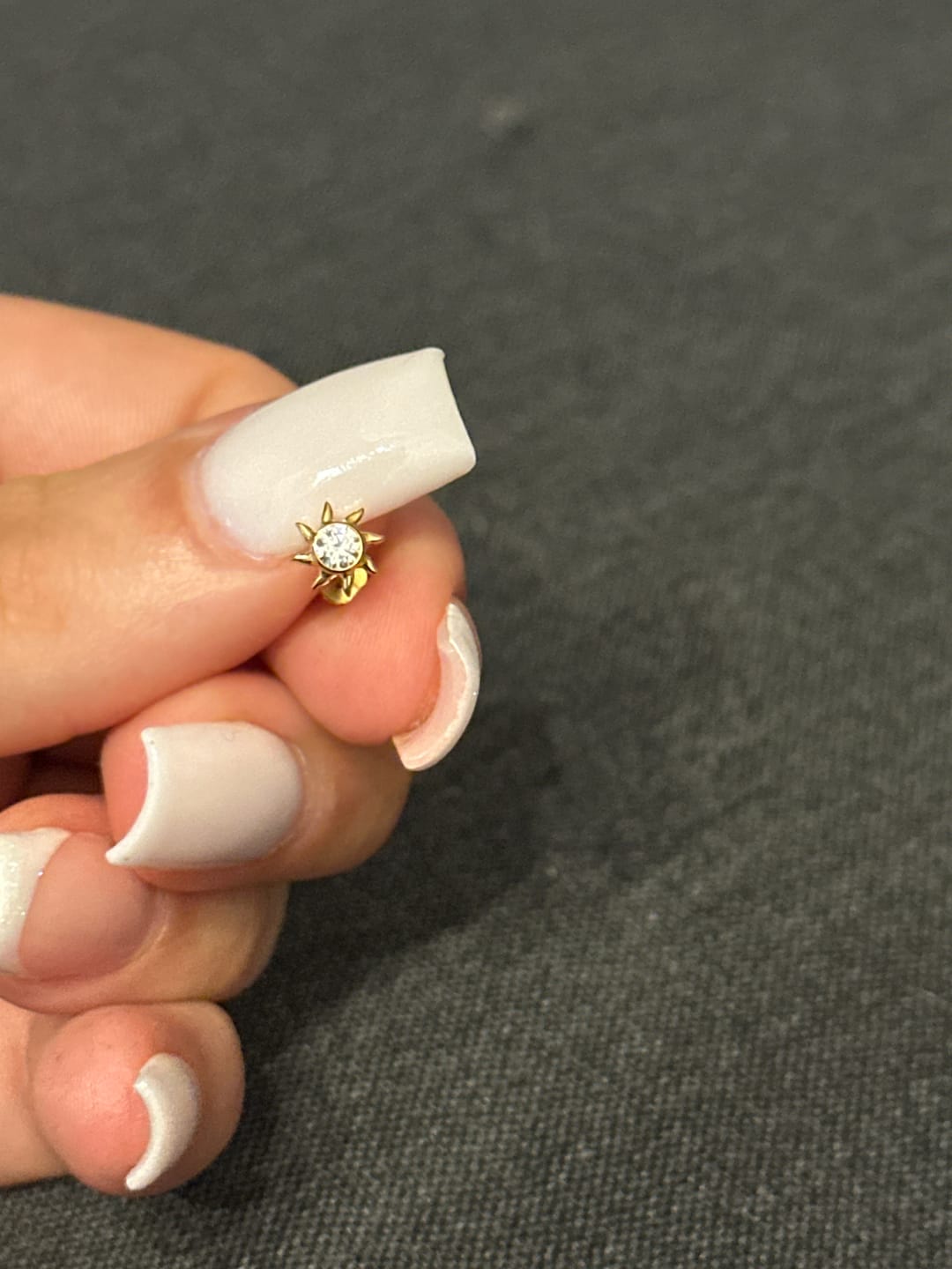 Customer photo review of Sunny Piercing | Titan