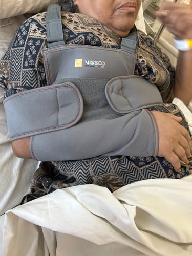 Customer photo review of Shoulder Immobilizer | Provides Firm Support for Shoulder Dislocation & Relieves Pain (Grey)