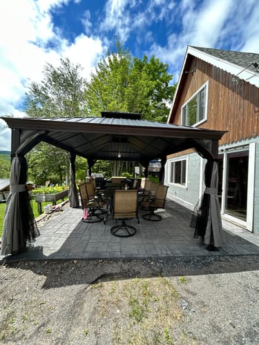 Customer photo review of EROMMY 12' x 20' Hardtop Gazebo, Wooden Finish Coated Aluminum Frame Canopy with Double Galvanized Steel Roof, Outdoor Permanent Metal Pavilion