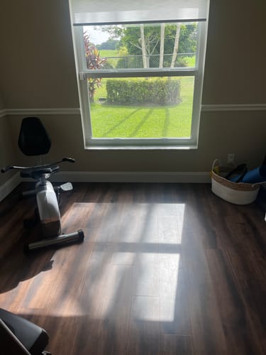 Customer photo review of SmartWings Motorized Light Filtering Roller Shades 70% Blackout Essential