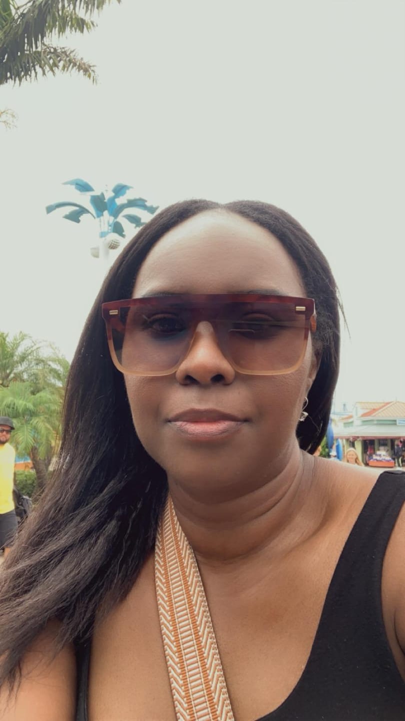 Customer photo review of Seamless Clip In Hair Extensions Kinky Straight