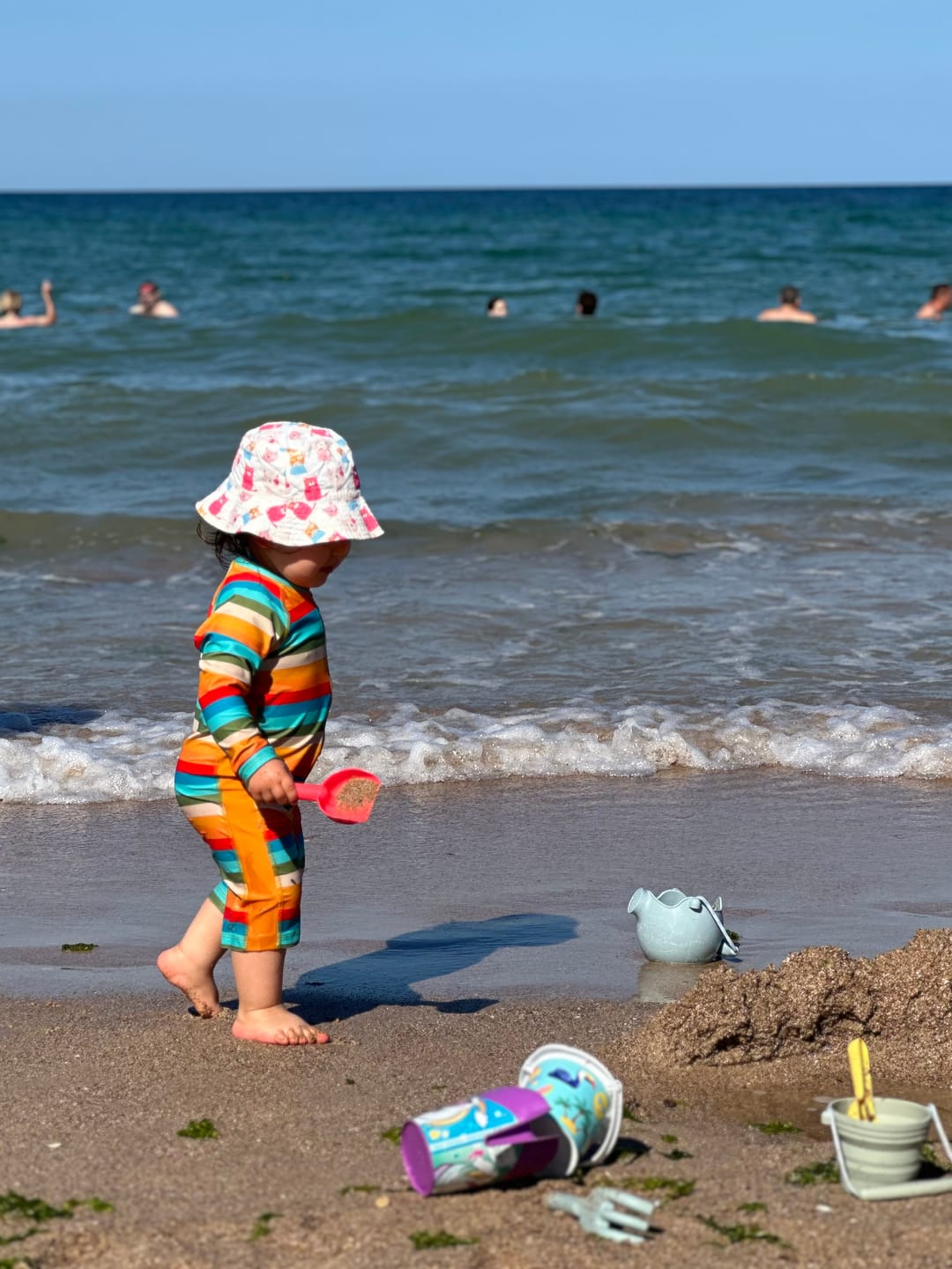 Customer photo review of Rainbow UPF 50+ Recycled Sunsafe Sunsuit