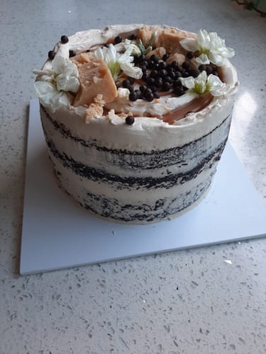 Customer photo review of chocolate caramel cake