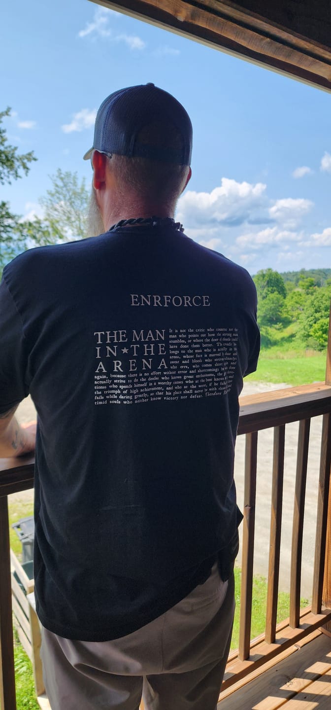 Customer photo review of Man in The Arena Tee