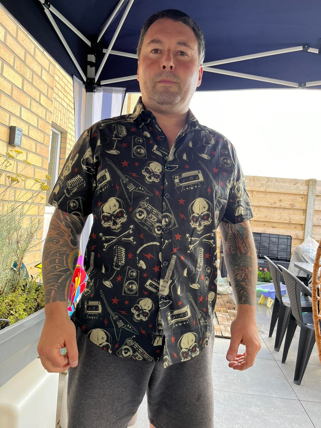 Customer photo review of Men's Skull Music Punk Rock and Roll Cool Funny Hawaiian Shirt