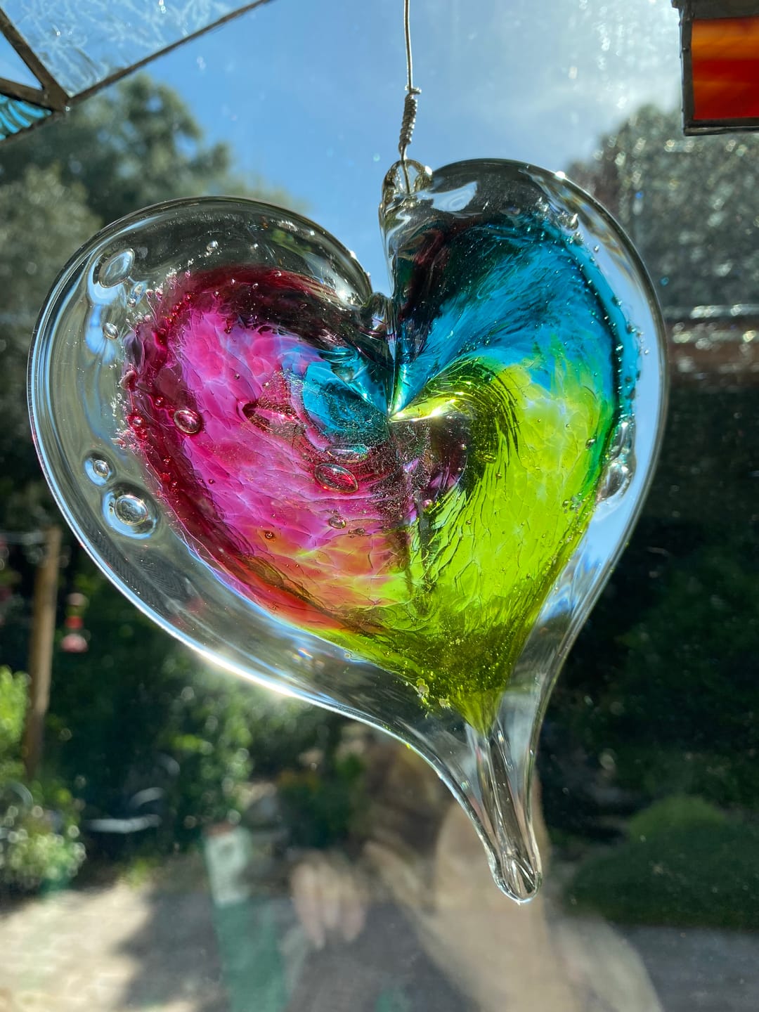 Customer photo review of Dichroic Heart Suncatcher with Infused Cremains