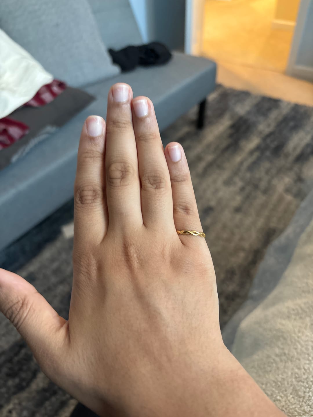Customer photo review of Infinity 18K Gold Twist Ring
