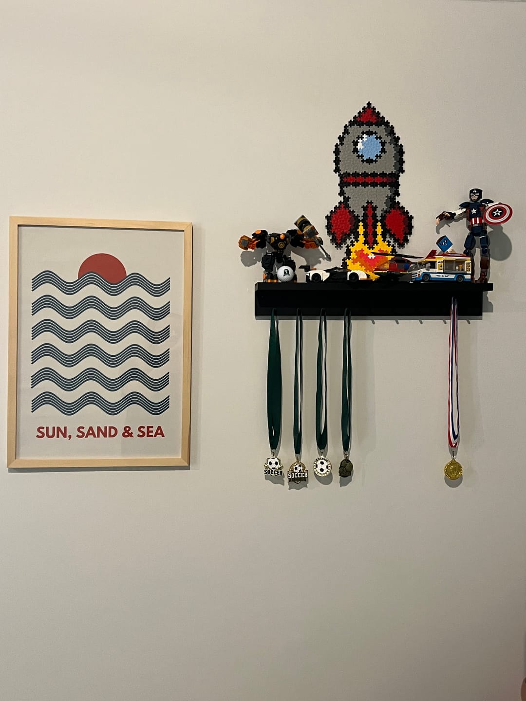 Customer photo review of 2ft Medal Awards Rack Premier Trophy Shelf- Trophy, Plaque and Medal Display