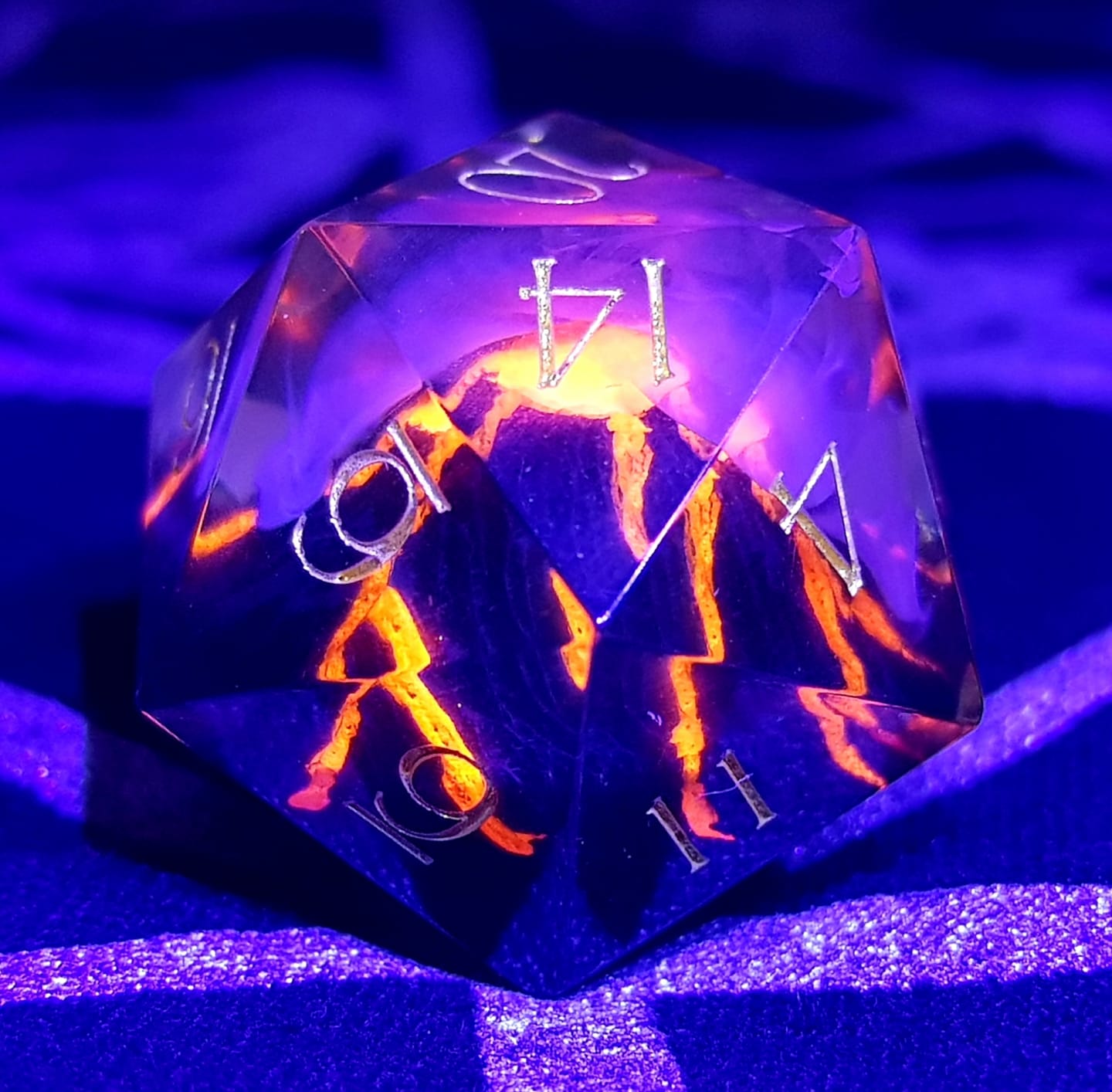 Customer photo review of URWizards D&D Resin Engraved Dice Set Mysterious Realm - Glowing Death Volcano