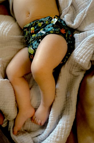 Customer photo review of Patterned Pocket Cloth Diaper with Athletic Wicking Jersey