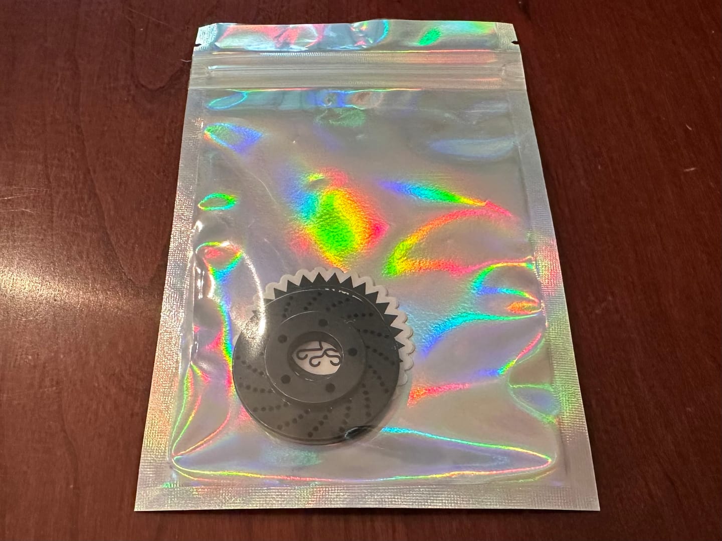Customer photo review of Rotor Golf Ball Marker - Black Oxide Carbon Steel | Kraken Golf