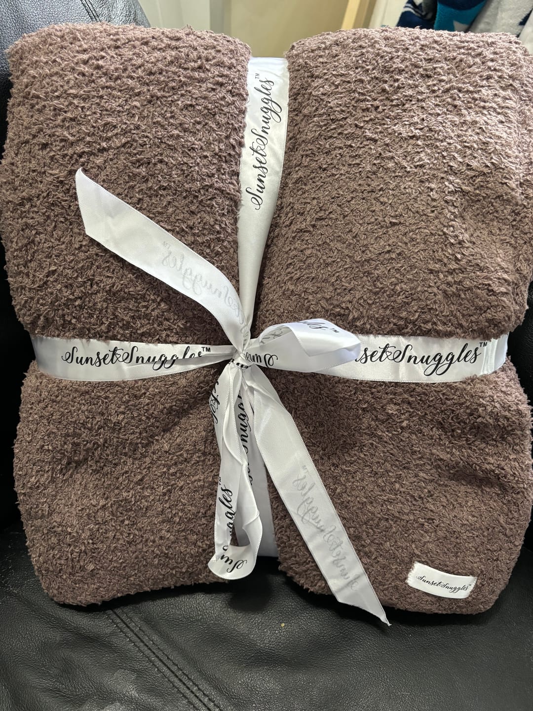 Customer photo review of Peppercorn Solid Double Layered Print Extended Throw