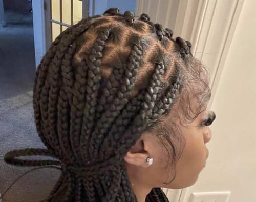Customer photo review of Kora - Pre Bleached Human Hair Lace Lightweight Knotless Swiss HD Lace Box Braided Wig 100 Strands
