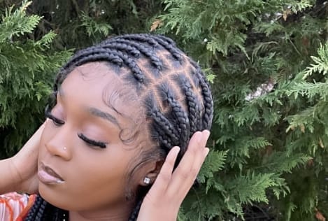 Customer photo review of Kora - Pre Bleached Human Hair Lace Lightweight Knotless Swiss HD Lace Box Braided Wig 100 Strands