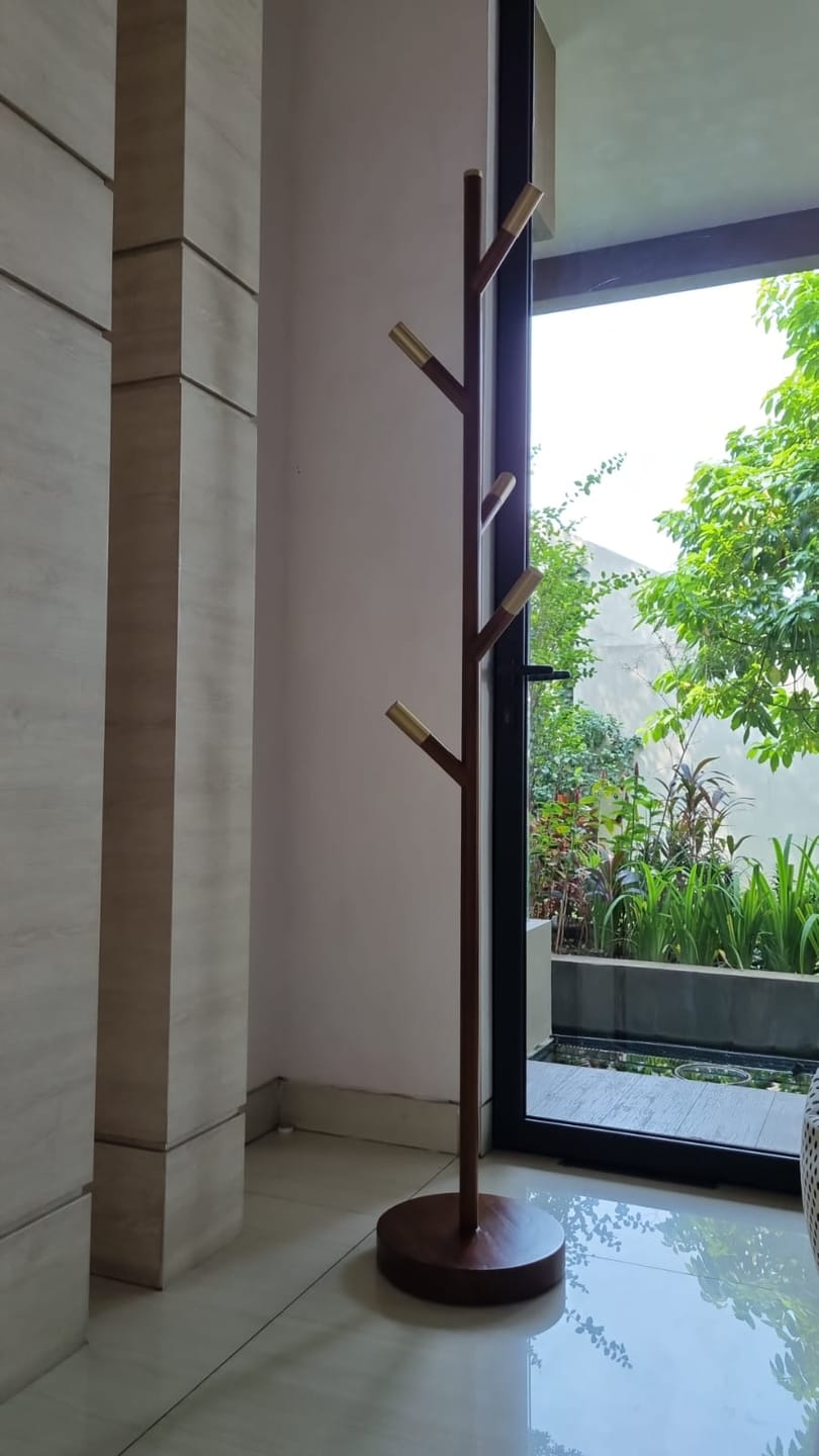 Customer photo review of Minimalist Teak Coat Rack – Branch Design