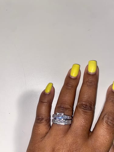 Customer photo review of Princess Cut Moissanite Staircase Channel Set Engagement Ring