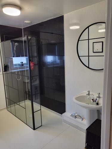 Customer photo review of Trieste Freestanding Matt Black Abstract 1400mm Wet Room Screen with Support Bars & Feet - 8mm Glass