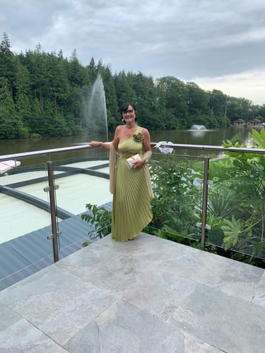 Customer photo review of Romantic Nights Satin Raised Flower Elastic Cutout One Shoulder Pleated Maxi Dress