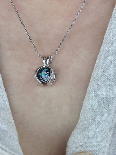 Customer photo review of Wishbone Sparkle Pendant with 10mm Marble with Cremains and Opal